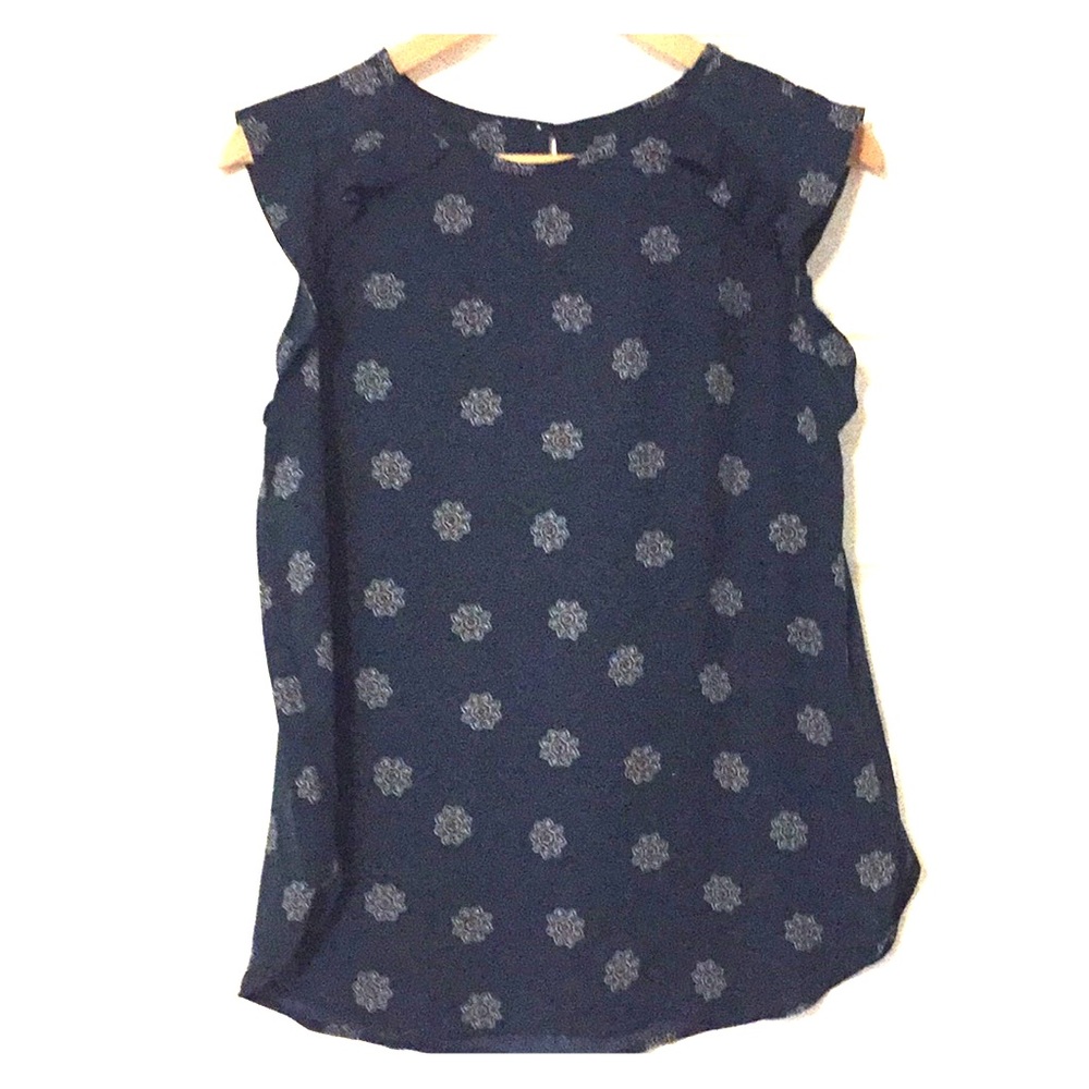 LOFT sleeveless shell with ruffles.